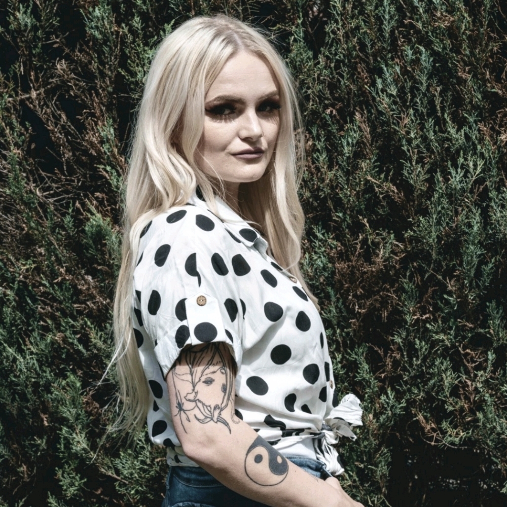 Small black and white polka dot tie up